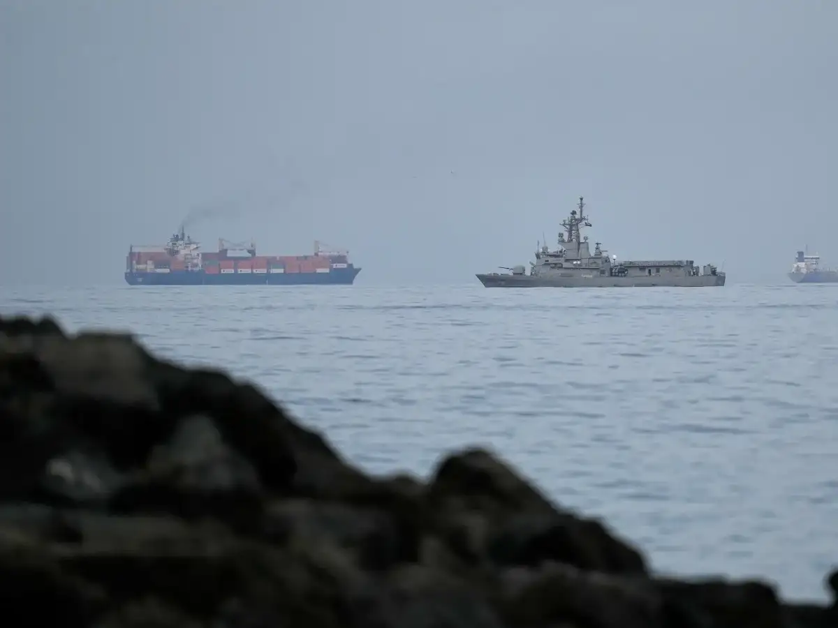 Iran war ceasefire tested as cargo ship catches fire and Kuwait and UAE repel drone attacks