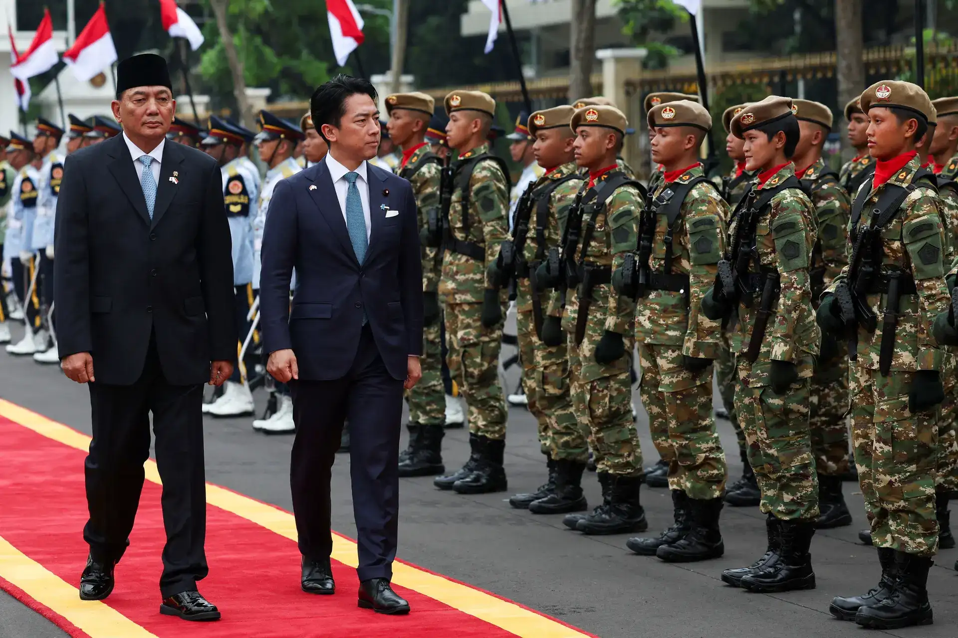 Japan refutes 'new militarism', accuses China of rapidly arming