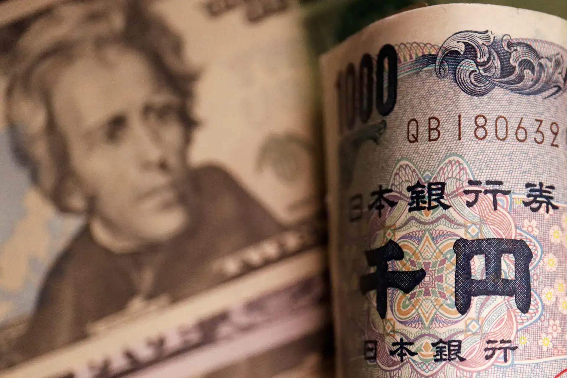 Dollar clings to 2-month high as Gulf hostilities flare, yen wobbles near intervention zone