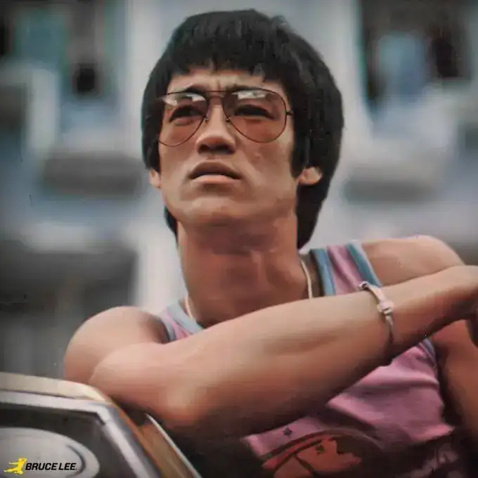 Life advice of the day by Bruce Lee: 'A goal is not always meant to be reached, it often serves simply as...' - inspiring quote and lessons on goal setting, ambition, resilience, personal growth by Jeet Kune Do creator and actor of Fist of Fury and Way of the Dragon
