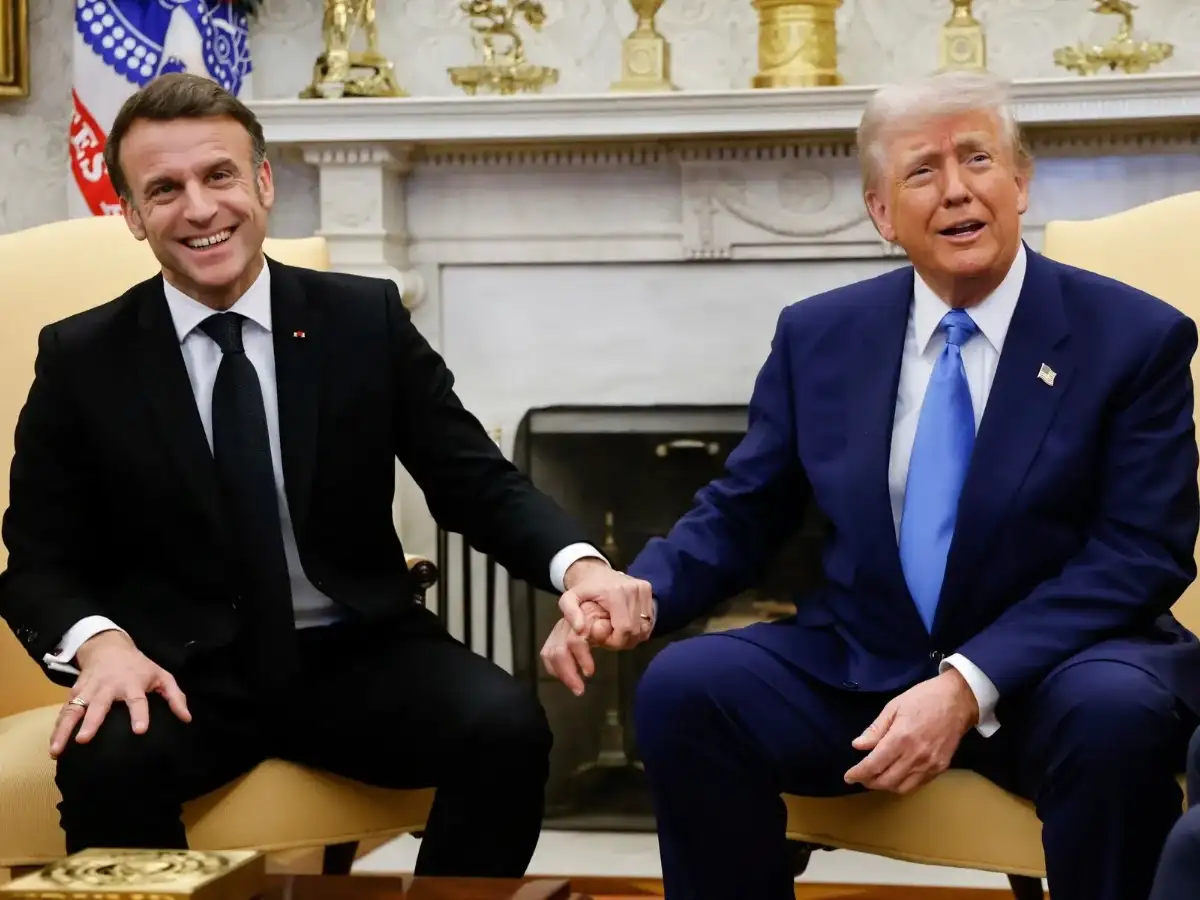From white knuckles to open barbs, Trump, Macron bring rocky