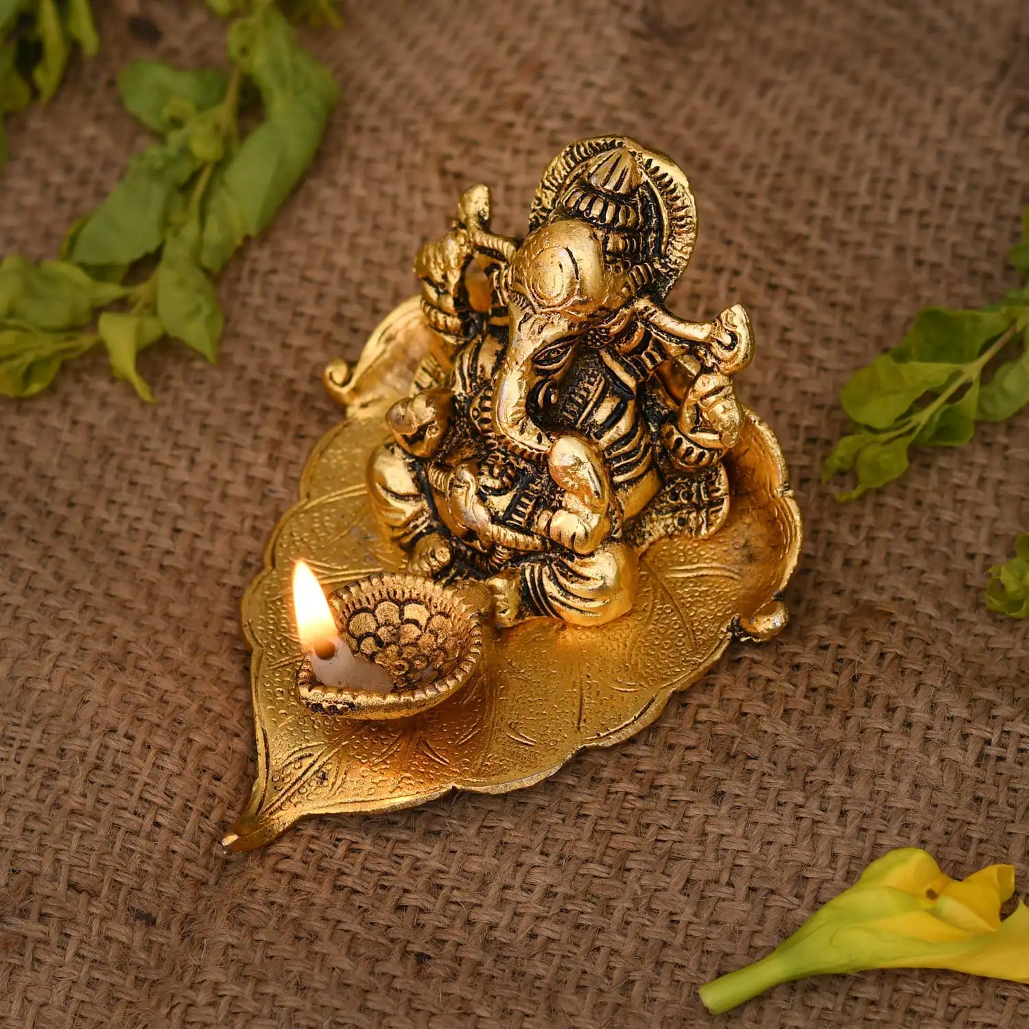 Image for CollectibleIndiaReturnGiftGaneshIdolonLeaf