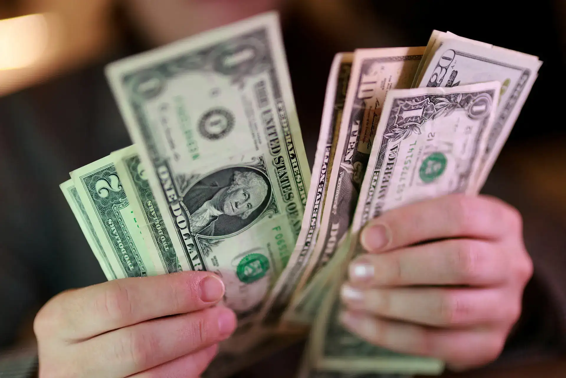 Dollar holds firm as Middle East hostilities lift oil