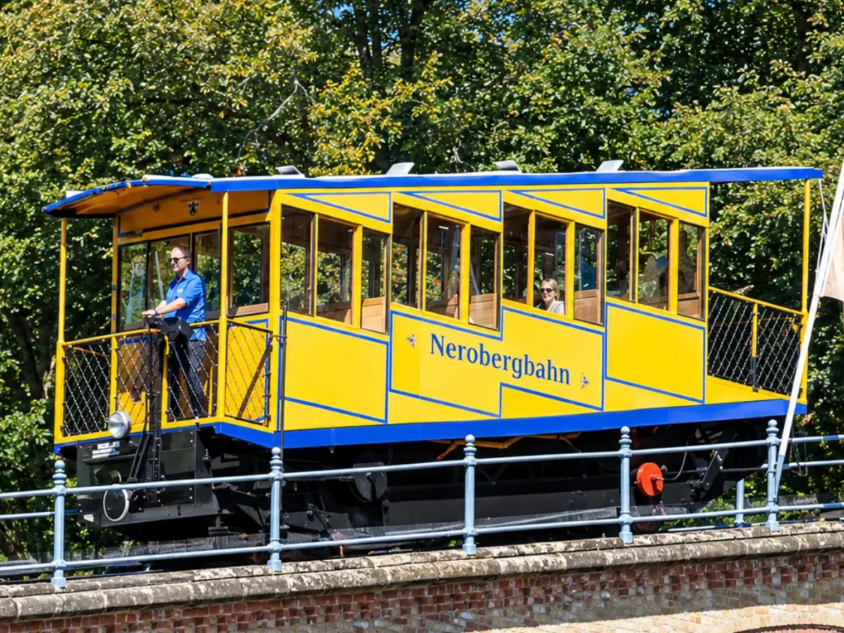 In 1888, a German city built a railway that climbs without an onboard engine: 1,849 gallons of water weigh one car down enough to pull the other 272 feet uphill 