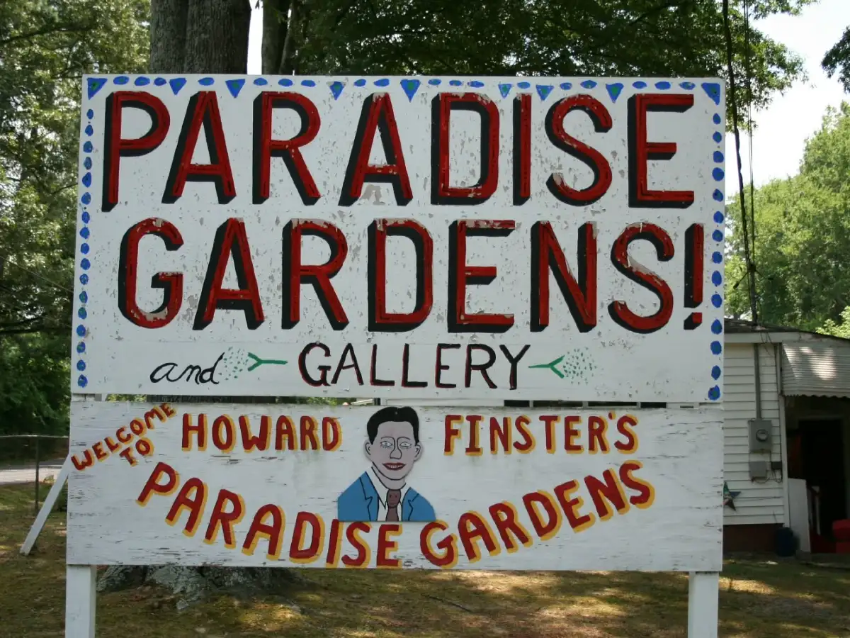 Howard Finster spent over 30 years turning a Georgia backyard swamp into Paradise Garden; the preacher’s handmade world survived him and remains open for tours 