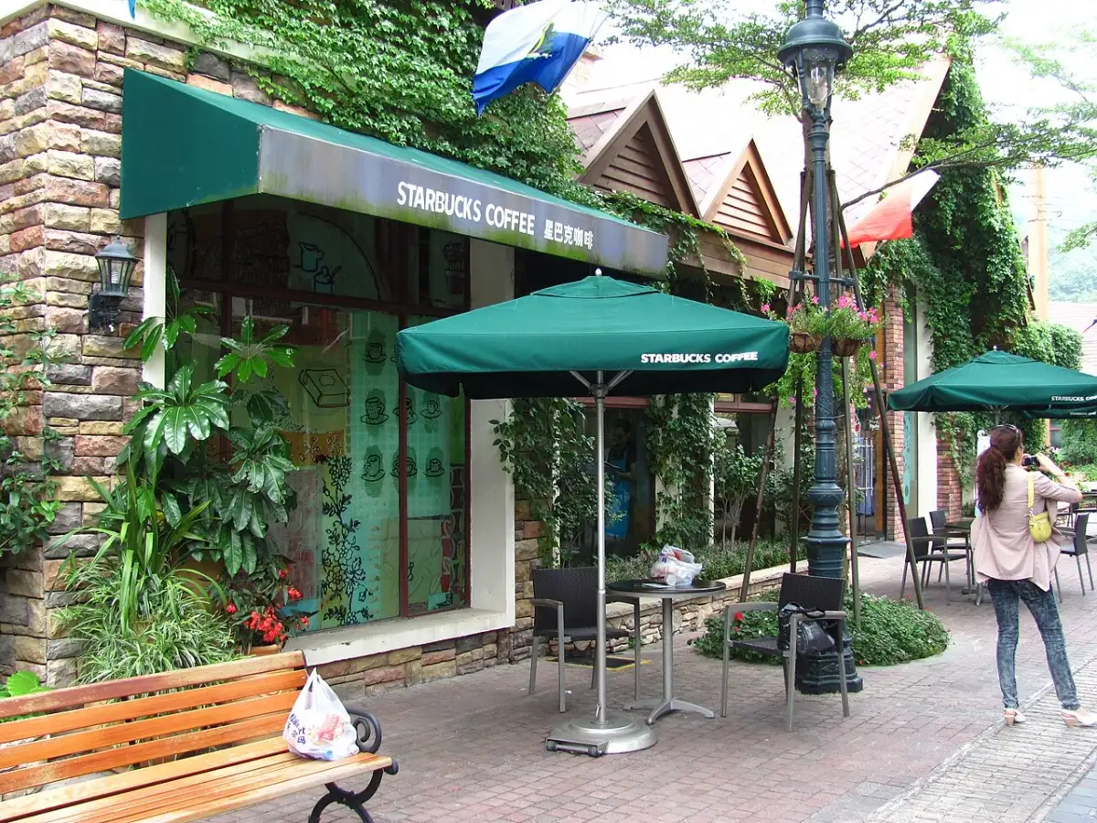 Magic Johnson quietly built 105 Starbucks stores in underserved urban neighborhoods; in 2010, he sold his stake back to Starbucks in a deal reported at about $75 million 