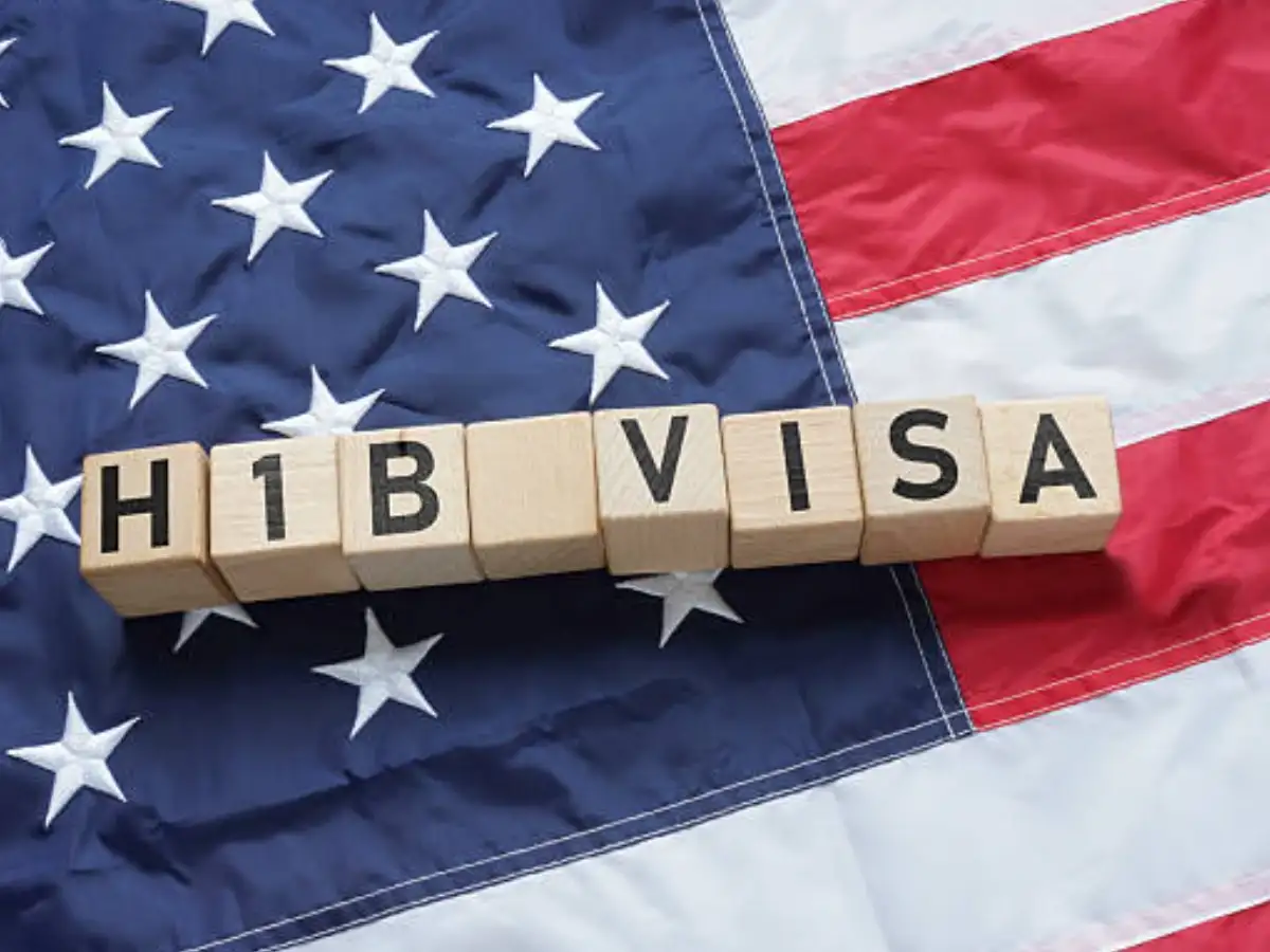 Can H-1B workers remain in the US if their