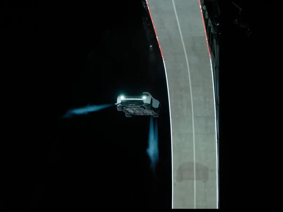 Tesla Roadster: Elon Musk uploads video showing Tesla flying  over a truck and other vehicles, watch viral footage 