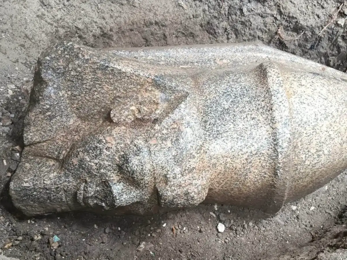 An Egyptian farmer found a mysterious pink stone in his field — it led archaeologists to two giant statues of Ramses II buried for centuries 