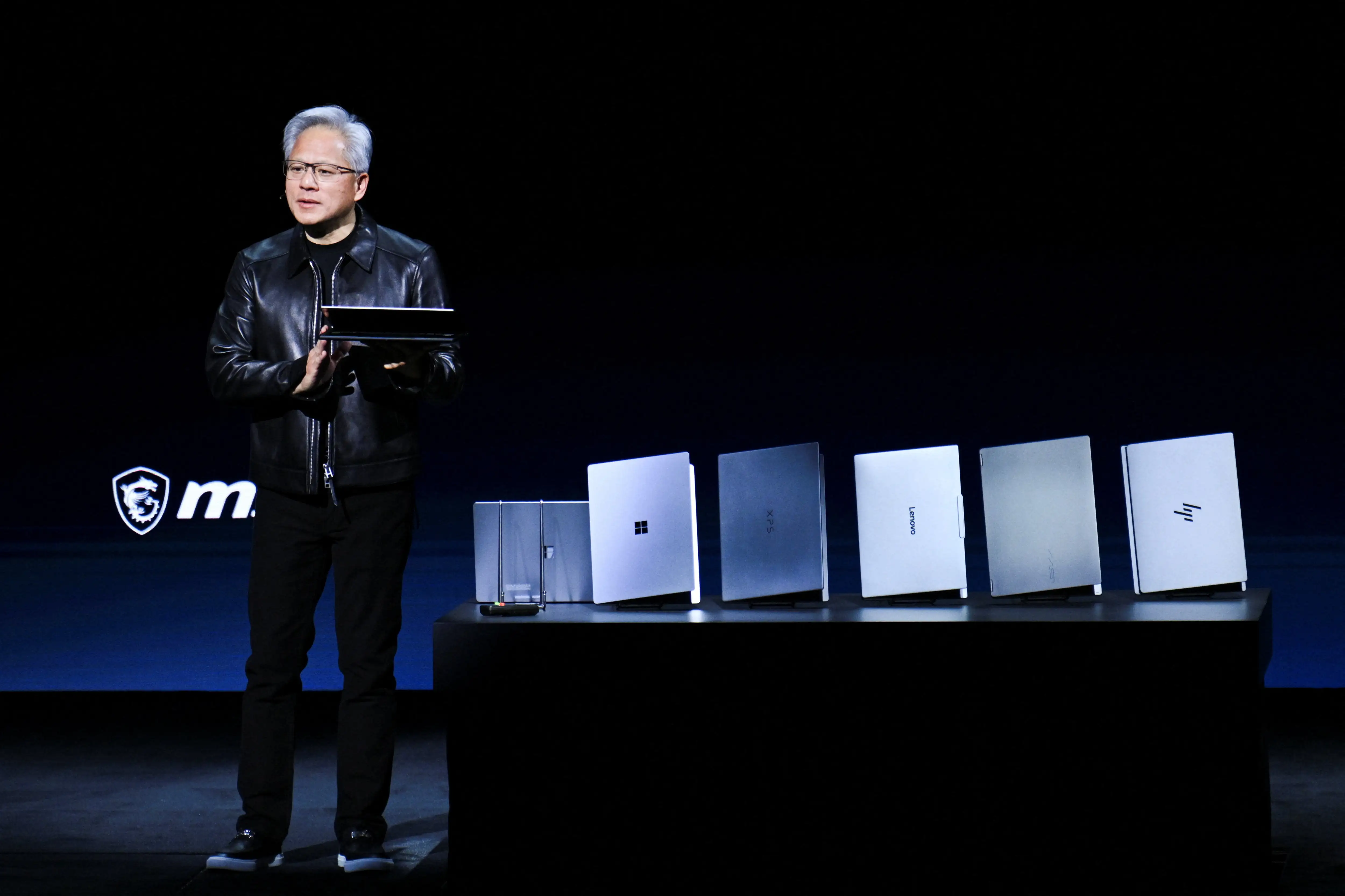 Nvidia's Huang hails Europe's AI potential, flanked by robot ducks