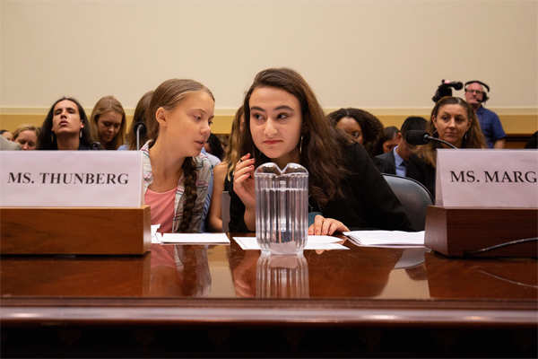 Greta Thunberg: Greta Thunberg 'fist bumps' with Obama, tells US ...