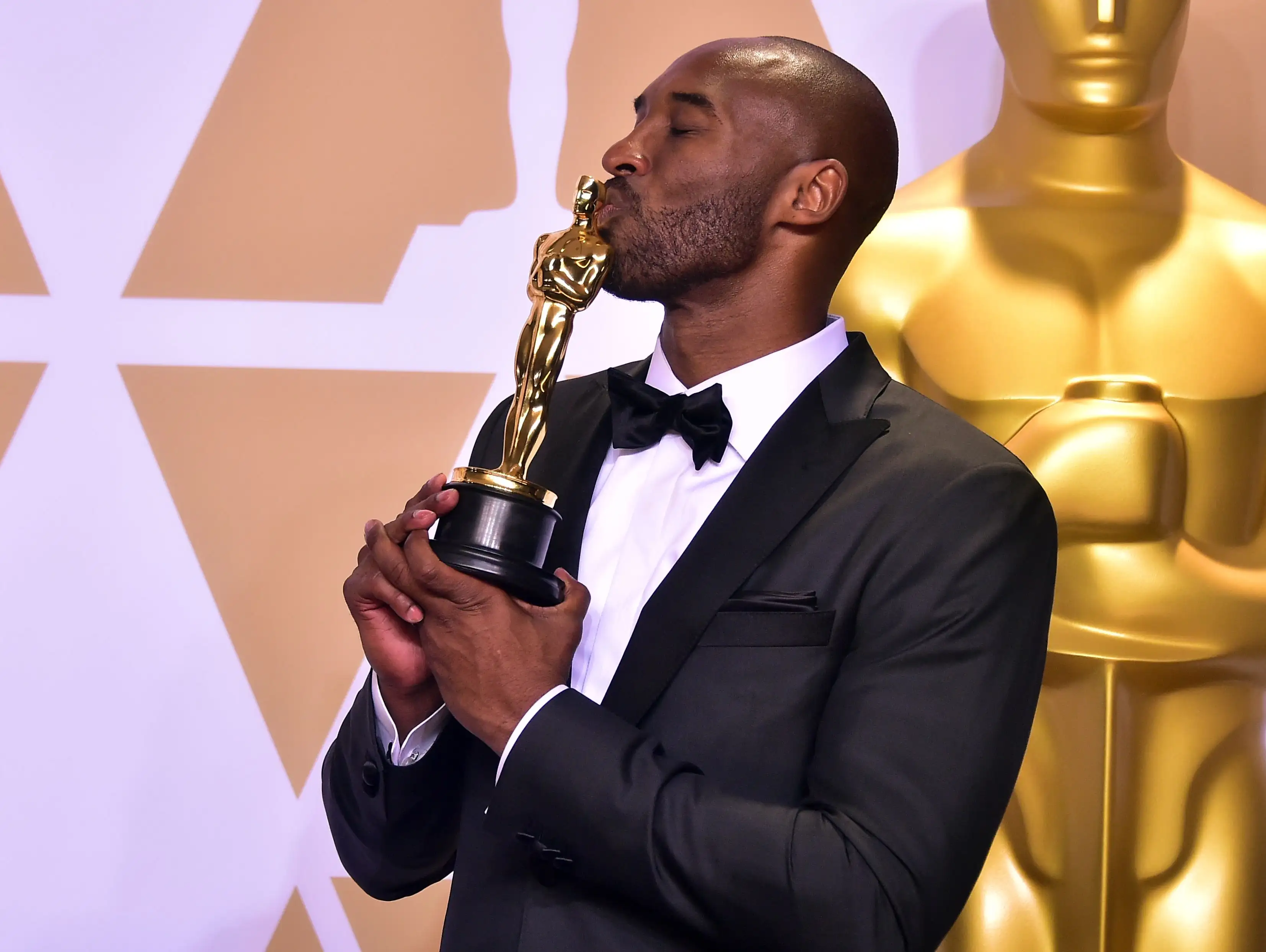 Kobe Bryant poses with the Oscar that he won for his movie 'Dear Basketball' in the Best Animated Short Film category in 2018 during the 90th Annual Academy Awards in Hollywood, California. Kobe Bryant poses with the Oscar that he won for his movie 'Dear Basketball' in the Best Animated Short Film category in 2018 during the 90th Annual Academy Awards in Hollywood, California.