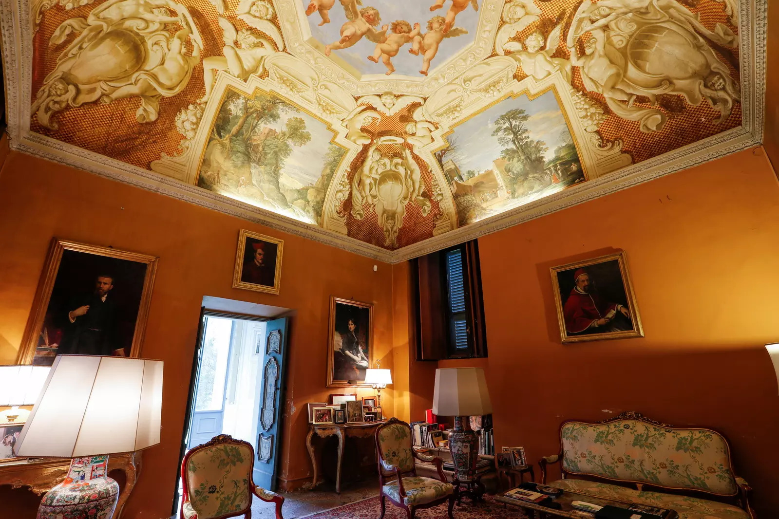 A general view shows a room, with frescoes on the ceiling by Italian artists including Guercino and Domenichino, inside Villa Aurora.