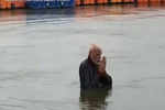 PM Modi takes holy dip at Kumbh Mela