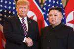 Trump, Kim shake hands in Hanoi