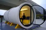 How about building your dream house under a pipe?