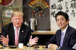 Trump and Abe do diplomacy over golf and sumo