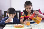 Let kids enjoy a glass of juice, it may improve their diet