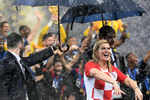 No damp squib: Despite Croatia cruising out of the WC, President Kolinda Grabar Kitarovic won a million hearts