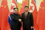 Kim, Xi portray strong ties in Beijing talks