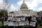 US students stage walkout against gun violence