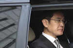 Samsung heir Lee appears in court for corruption retrial