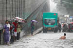 Mumbai rains hits normal life; schools shut, trains delayed