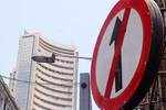 Market tanks as rupee hits record low