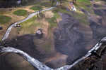 Green grass, black lava at Guatemala golf club