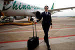 Female pilots in China strain to hold up half the sky