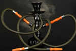 Thought smoking hookah is safer? Turns out, it adds more toxins than a cigarette