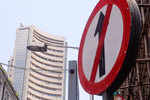 Sensex 214 pts lower; Nifty holds 11,250
