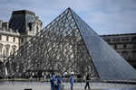 Louvre's glass pyramid set for interactive performance for 30th anniversary