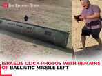 Israelis click photo with remains of ballistic missile left in southern Israel after Iran's attack