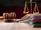 NCLAT sets aside Zaveri Group's bid for Gujarat Hydrocarbons and Power SEZ