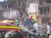 Building crumbles in Mumbai, many feared trapped