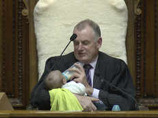 NZ parliament speaker, seen soothing a MP's baby as debate rages, wins the Internet's heart