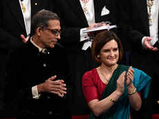 Nobel Prize ceremony: Abhijit Banerjee sticks to Bengali roots in a dhoti, Esther Duflow stuns in saree