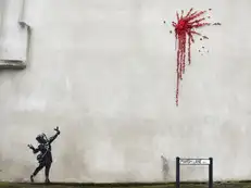 With love, from Banksy: Valentine's Day mural by street artist plays with violence and innocence