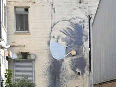 Banksy's artwork gets a makeover; 'Girl with a Pierced Eardrum' mural dons a coronavirus face mask