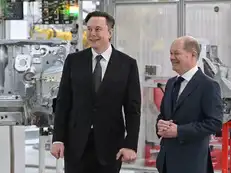 Elon Musk dances at Tesla's factory opening in Germany. The Internet is smitten