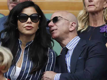 Jeff Bezos and girlfriend Lauren Sanchez sail across Venice's canals in a boat