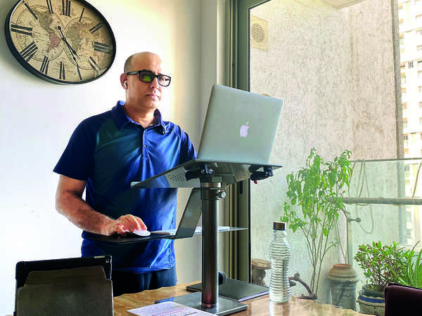A standing desk at home helps this CEO 'think on his feet' during lockdown