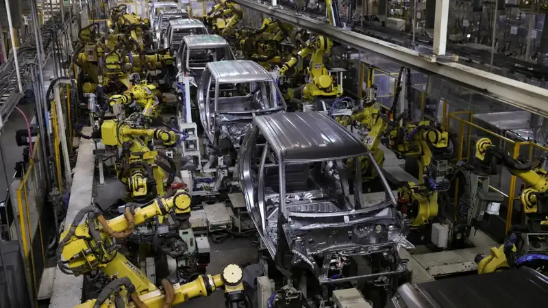 Carmakers partly absorb commodity shocks to keep production on track