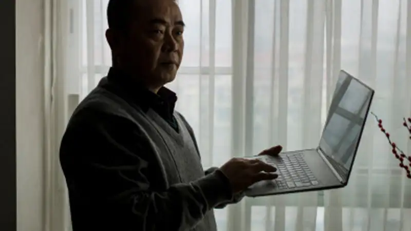 China's first 'cyber-dissident' given 12-year jail term China's first 'cyber-dissident' given 12-year jail term