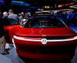 Automakers roll out new battery-powered cars at Geneva show