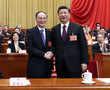 Empowered Xi says China ready to fight 'bloody battle'