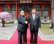 Kim, Xi break the ice with wine and secret pageantry