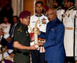 Lt. Col M S Dhoni, marches in style, to receive Padma Bhushan