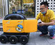 In China, yellow robots deliver snacks to your home